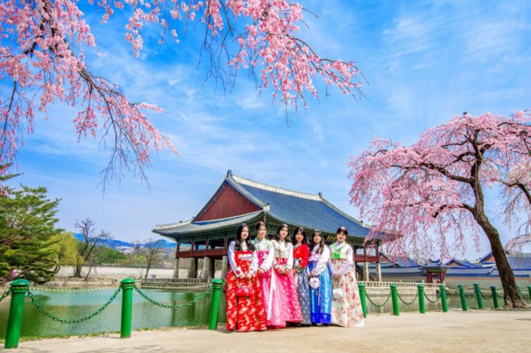 gyeongbokgung palace with cherry blossom spring tourists with hanbok dress scaled e1722334322714