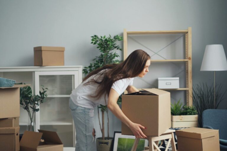 woman lifting box